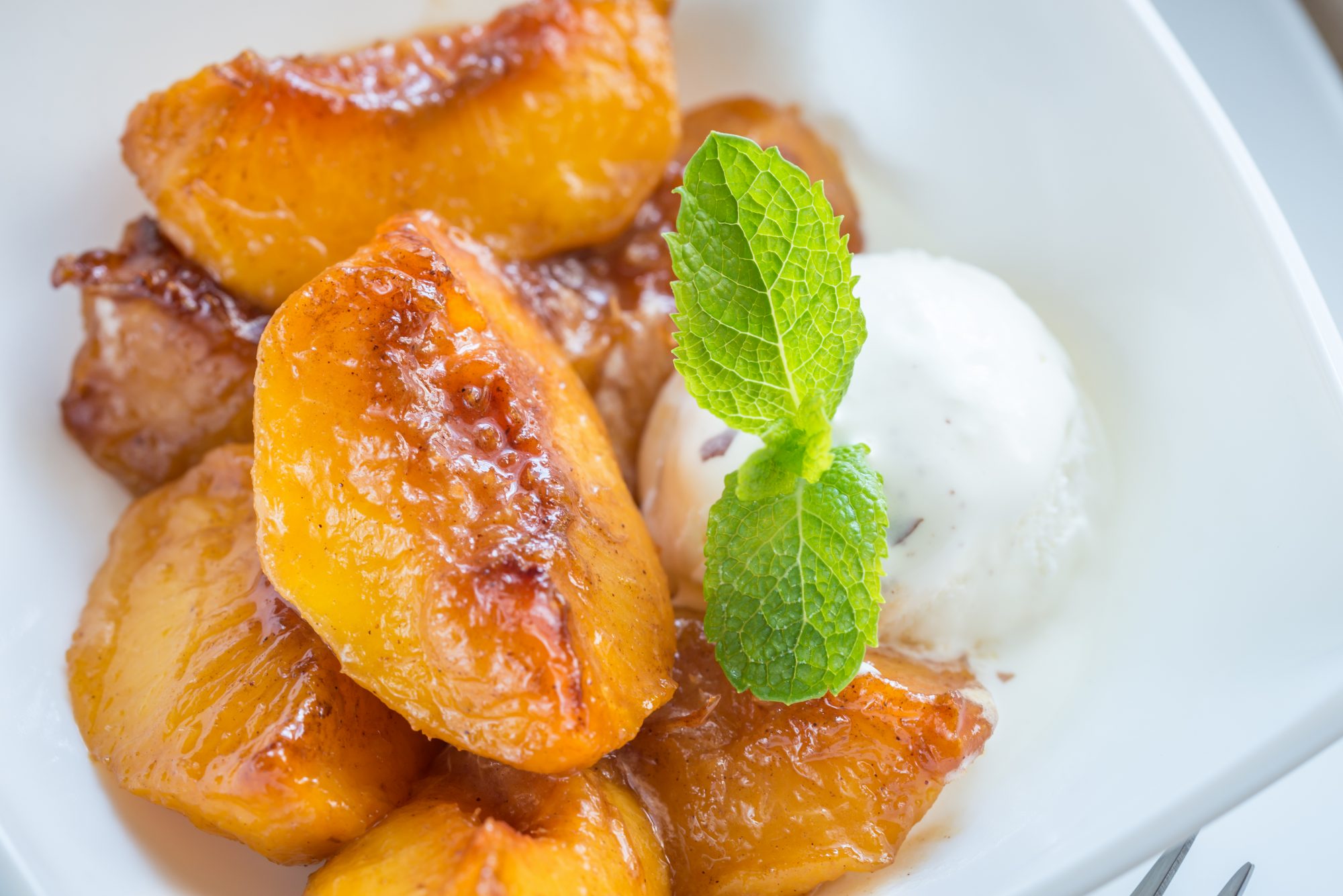 Try José Pizzaro’s Rosemary Peaches with Vanilla-and-Orange Sherbet 